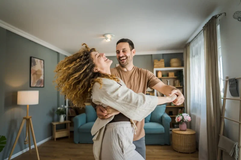 Profile Homes couple dancing in living room